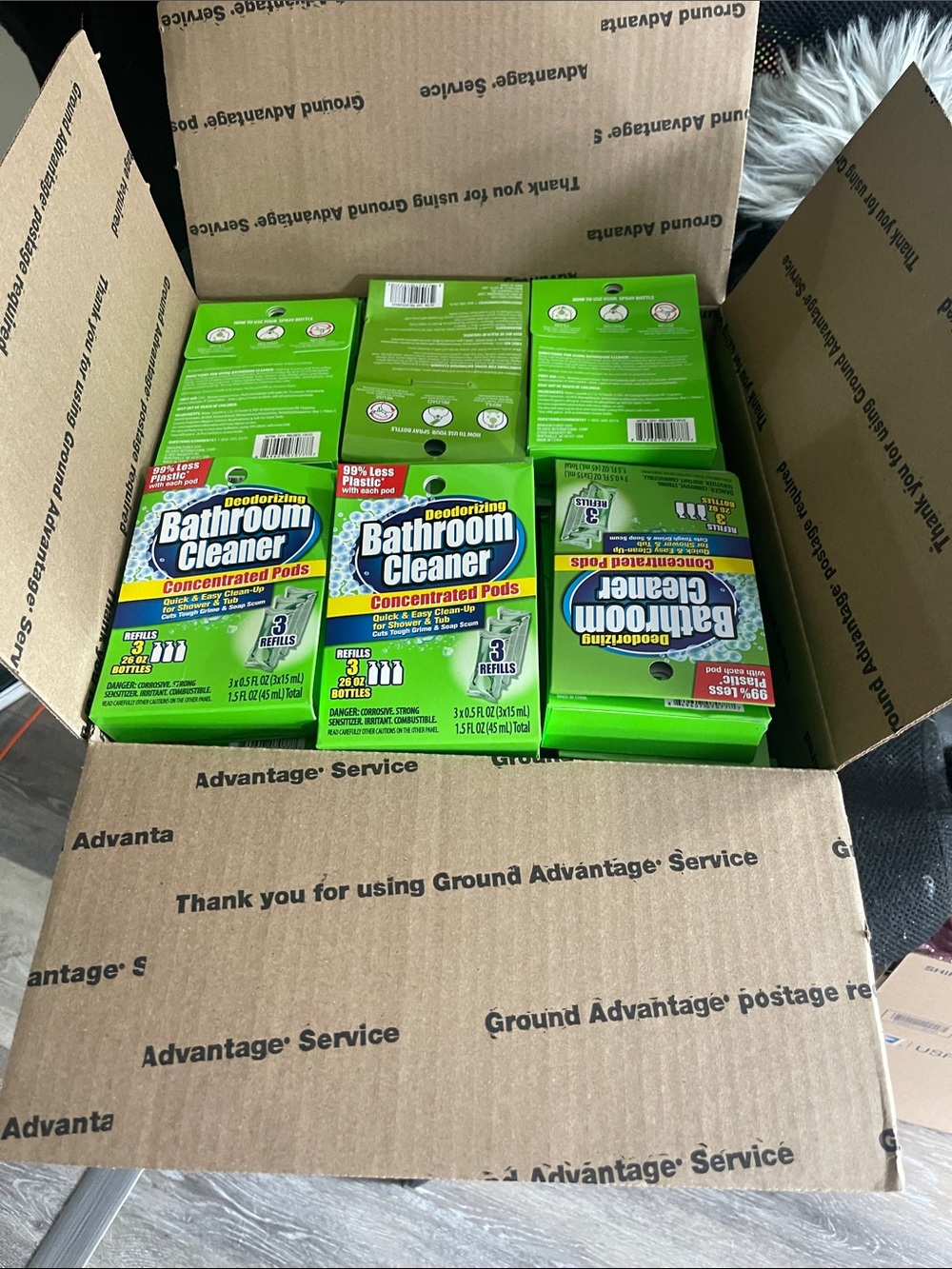 Box full of deodorizing bathroom cleaner